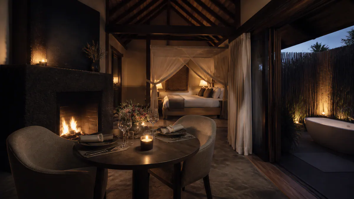 Thoughtful couples-stay details including a dining nook, fireplace and private outdoor bath