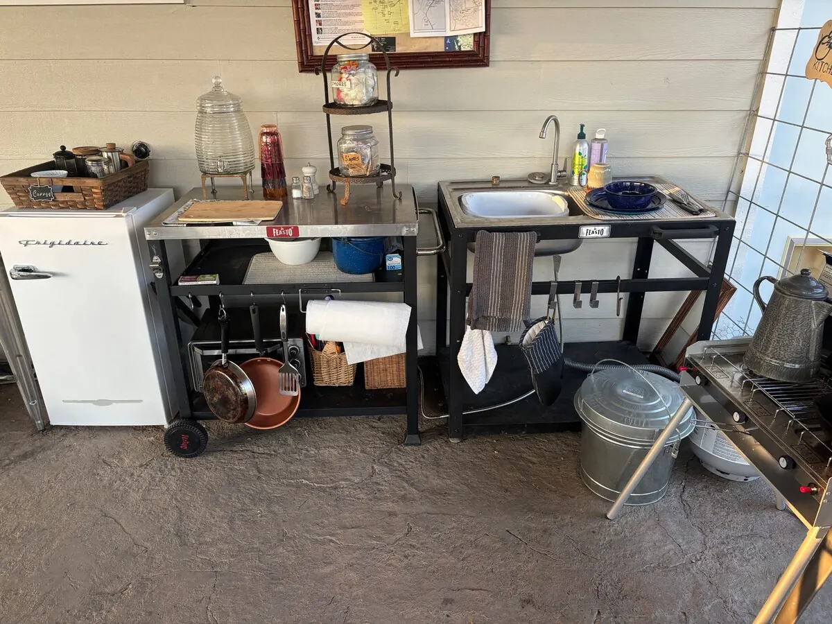 Stainless steel guest kitchen with everything you need. at Panoramic View Campsite – bring your own tent or small camper in Hidden Valley Lake